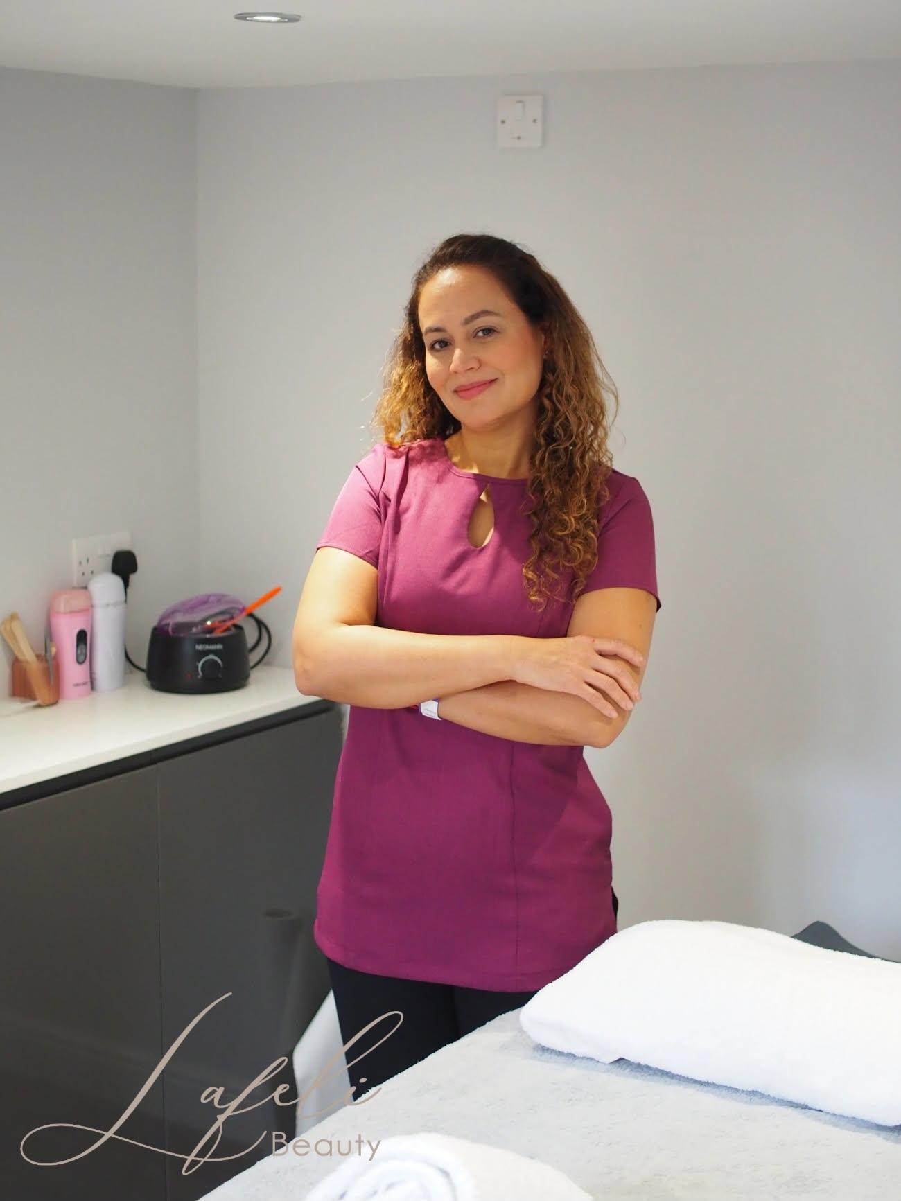 Portrait of Lili, founder of Lafeli Beauty, smiling in her Willaston studio